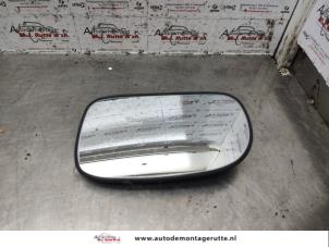 O140917 Gebruikte spiegelglas links Suzuki Baleno