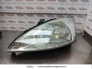 O140941 Gebruikte linker koplamp Ford Focus
