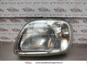 O140953 Gebruikte linker koplamp Nissan Micra