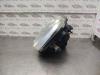 Gebruikte Koplamp links Nissan Micra O140953