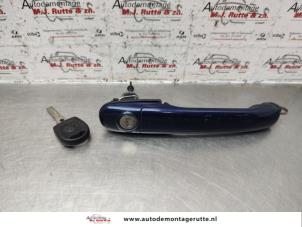 O141000 Gebruikte portiergreep 2deurs links Volkswagen Polo