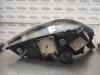 Gebruikte Koplamp links Opel Vectra O141083