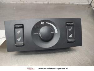 O141604 Gebruikte schakelaar stoelverwarming Chrysler Pacifica