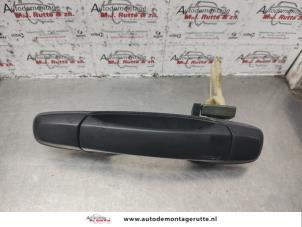 O141637 Gebruikte portiergreep 4deurs links-achter Subaru Forester