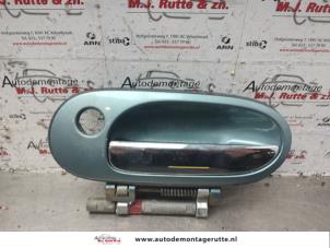 O141691 Gebruikte portiergreep 4deurs links-voor Nissan Almera
