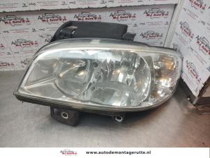 O141698 Gebruikte koplamp links Seat Ibiza