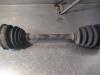 Gebruikte Aandrijfas links-voor Volkswagen Polo O142253