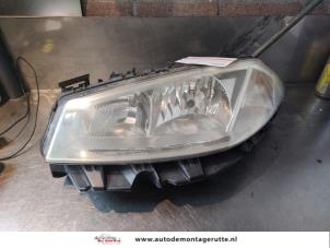 O142257 Gebruikte koplamp links Renault Megane