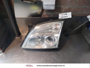 O142506 Gebruikte linker koplamp Opel Vectra