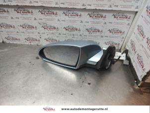 O142764 Gebruikte spiegel buiten links Nissan Primera