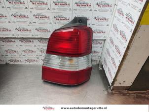 O142995 Gebruikte achterlicht rechts Mazda Demio