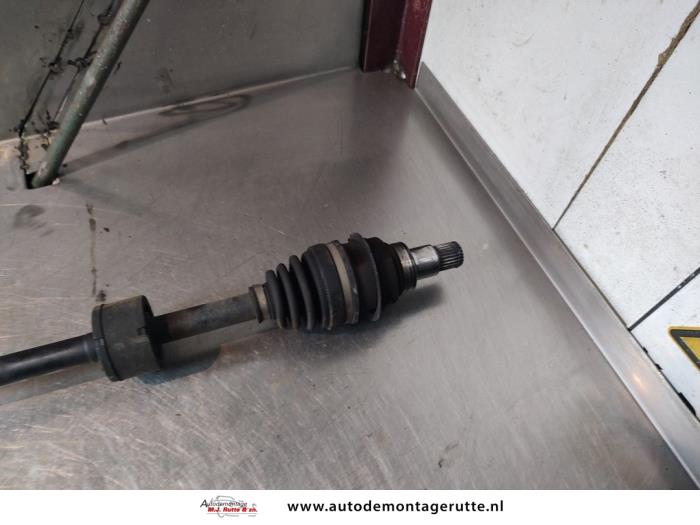 Aandrijfas rechts-voor van een Daihatsu Cuore (L251/271/276) 1.0 12V DVVT 2008