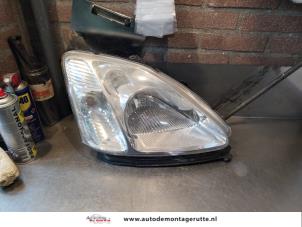 O143464 Gebruikte koplamp rechts Honda Civic
