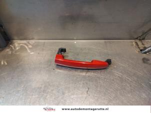 O143648 Gebruikte deurgreep 2deurs links Suzuki Swift