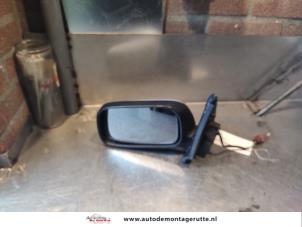 O143722 Gebruikte spiegel buiten links Nissan Almera