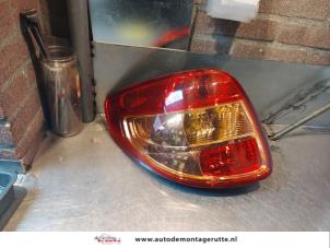 O143809 Gebruikte achterlicht links Suzuki SX-4