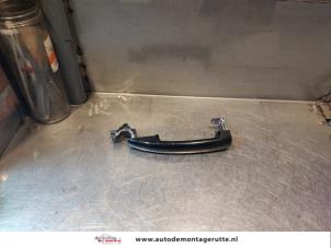 O143811 Gebruikte portiergreep 4deurs links-voor Peugeot 308