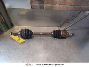 O143932 Gebruikte cardanas links-voor (vwa) Kia Rio