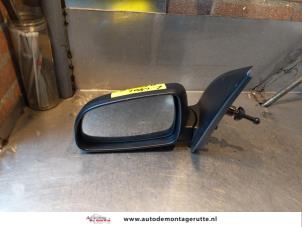 O144024 Gebruikte spiegel buiten links Chevrolet Aveo