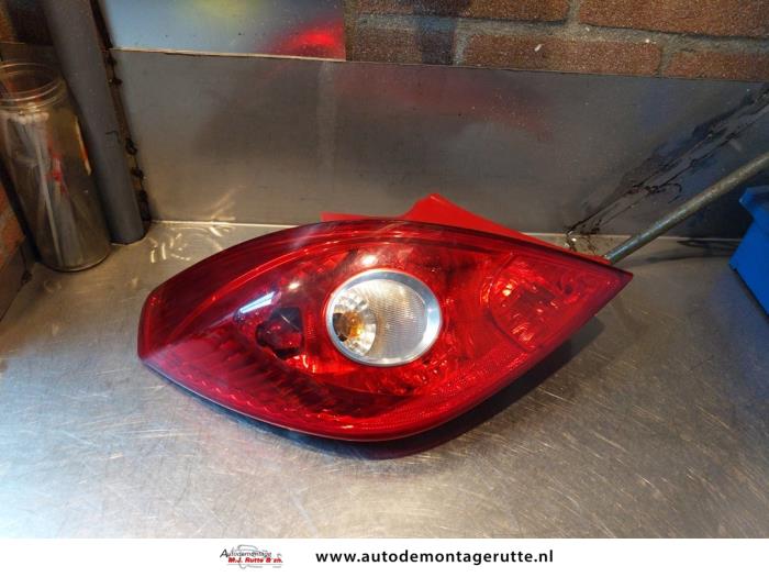 Gebruikte Achterlicht links Opel Corsa O144113