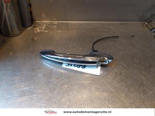 O144256 Gebruikte portiergreep 2deurs links Mini ONE