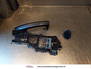 O144376 Gebruikte portiergreep 4deurs links-achter Volkswagen Passat