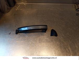 O144378 Gebruikte portiergreep 4deurs links-voor Volkswagen Passat
