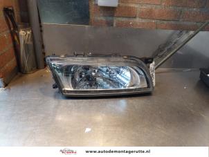 O144451 Gebruikte koplamp rechts Nissan Almera