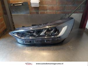 O144531 Gebruikte linker koplamp Ford Focus