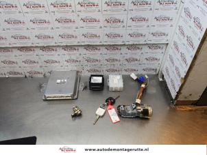 O144780 Gebruikte kontaktslot + computer Subaru Impreza