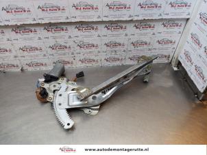 O144781 Gebruikte ruitmechaniek 4deurs links-achter Subaru Impreza