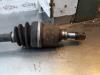 Gebruikte Aandrijfas links-voor Suzuki Swift O145027