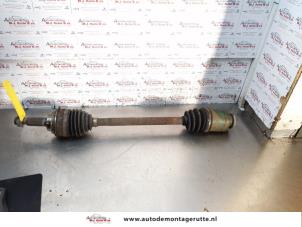 O145038 Gebruikte homokineetas links-voor Subaru Impreza