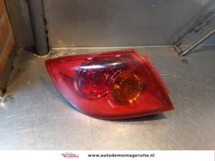 O145156 Gebruikte achterlicht links Mazda 3.