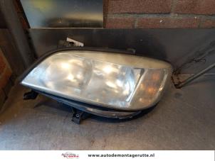 O145222 Gebruikte koplamp links Opel Zafira