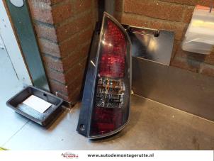 O145570 Gebruikte achterlicht rechts Daihatsu Sirion