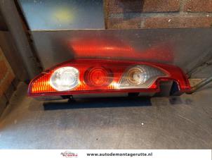 O145628 Gebruikte achterlicht links Renault Kangoo