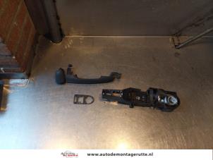 O145718 Gebruikte portiergreep 2deurs rechts Renault Kangoo