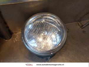 O145775 Gebruikte rechter koplamp Jeep Cherokee