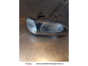 O145811 Gebruikte rechter koplamp Suzuki Alto