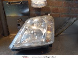 O146258 Gebruikte linker koplamp Opel Meriva
