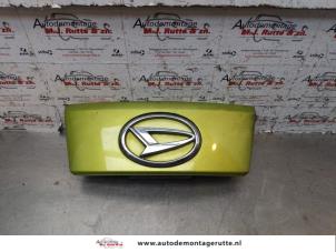 O146571 Gebruikte handgreep achterklep Daihatsu Sirion