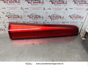 O147096 Gebruikte reflector achterklep links Nissan Note