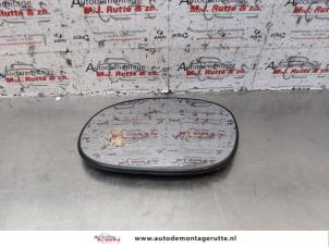 O147249 Gebruikte spiegelglas links Peugeot 1007