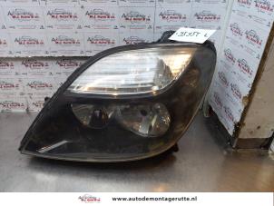 O147261 Gebruikte linker koplamp Renault Megane Scenic