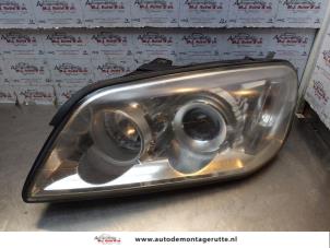 O147560 Gebruikte koplamp links Chevrolet Captiva