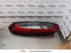 O147789 Gebruikte achterlicht links Opel Corsa