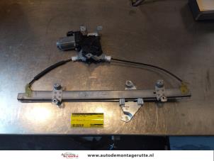 O147975 Gebruikte ruitmechaniek 4deurs links-voor Nissan Note