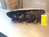 Gebruikte Koplamp links Chrysler Sebring O148008