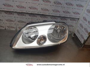 O148281 Gebruikte koplamp links Volkswagen Caddy
